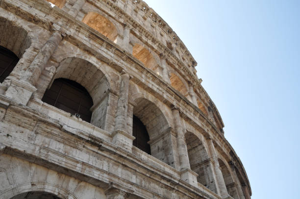istock Colosseum with a Beautiful Clear Sky Background in Rome 1003878396