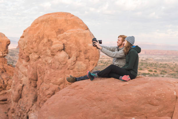 istock Couple taking a selfie in the Utah desert 1003878458