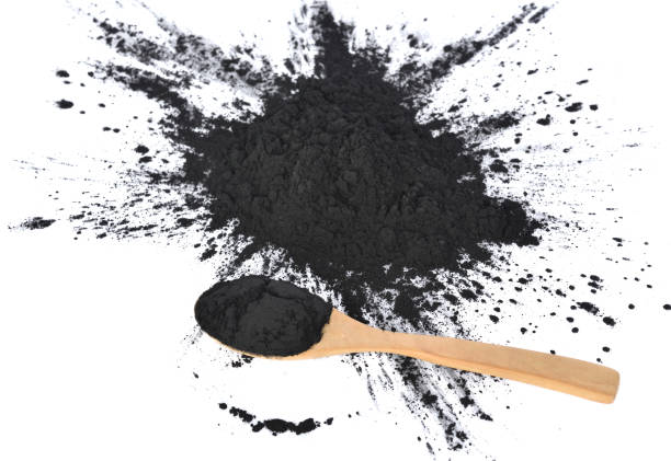 istock Top view of charcoal on white background 1003881084