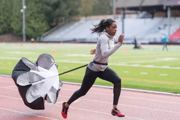 Photo of Female track athlete training at stadium