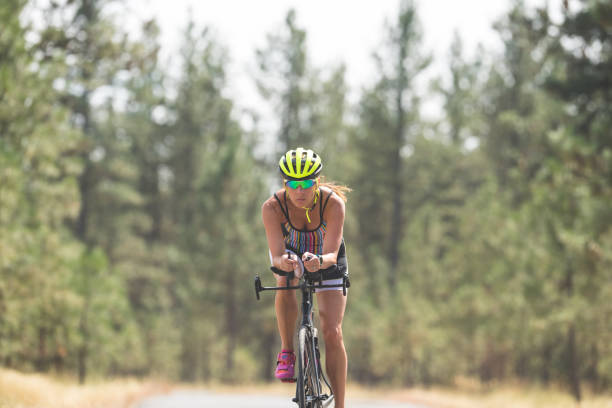 istock Female triathlete doing cycling stage 1003891990