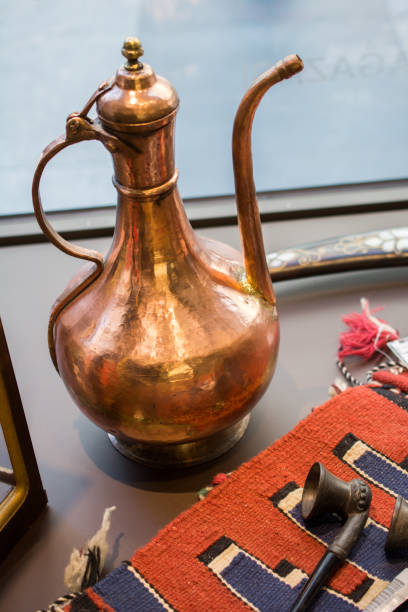 istock Ancient metal jug in oriental style 1003895922