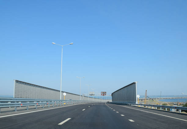 istock Access road to the Crimean bridge. 1003896100