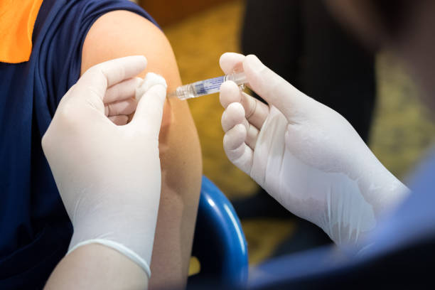 istock Medical vaccine in shoulder 1003898780