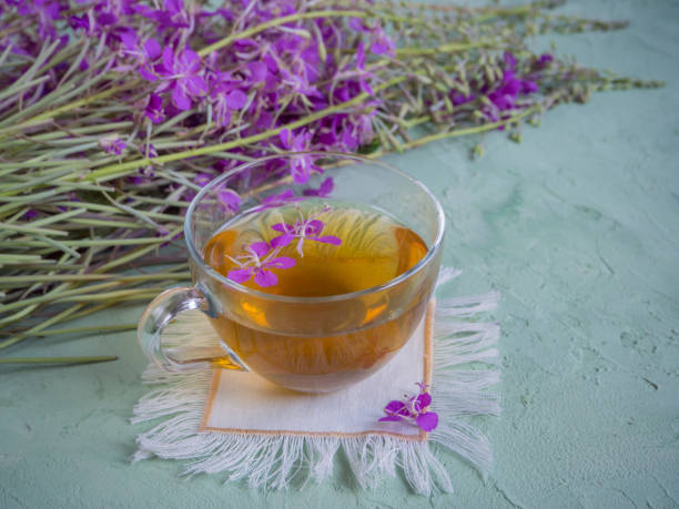 istock Traditional Russian herbal drink Ivan-tea in a transparent cup. Positively affects the human body. 1003903894