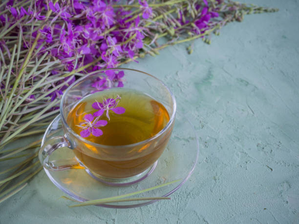 istock Traditional Russian herbal drink Ivan-tea in a transparent cup. Positively affects the human body. 1003903896