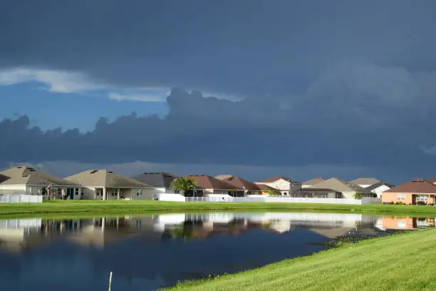 A stunning view of this community after a powerful tropical storm during summer season. The sky cleared allowing the sunlight to shine over the wet landscape, city of Riverview, Florida.
