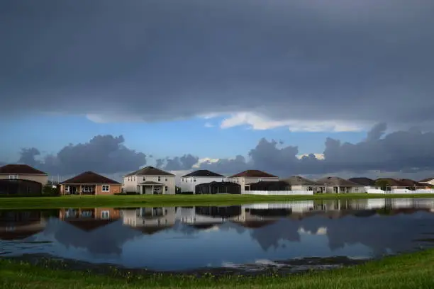 A stunning view of this community after a powerful tropical storm during summer season. The sky cleared allowing the sunlight to shine over the wet landscape, city of Riverview, Florida.