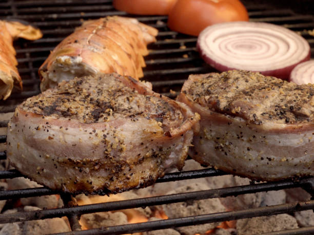 istock Grilled Bacon Wrapped Filet Mignon Steak and Lobster on Barbecue 1003906682