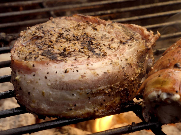 istock Grilled Bacon Wrapped Filet Mignon Steak and Lobster on Barbecue 1003906824