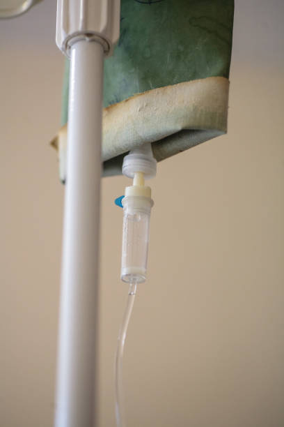 istock Dropper in a vein close-up 1003921032
