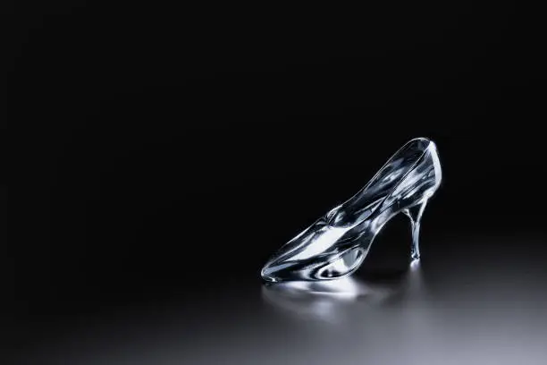 3D Render of Cinderella's glass slipper on a blue background