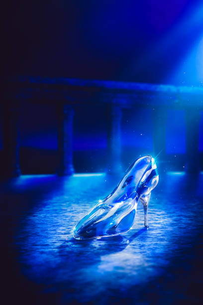 istock Cinderella's glass slipper on castle's floor/ 3D rendering 1003943168