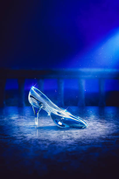 istock Cinderella's glass slipper on castle's floor/ 3D rendering 1003943236
