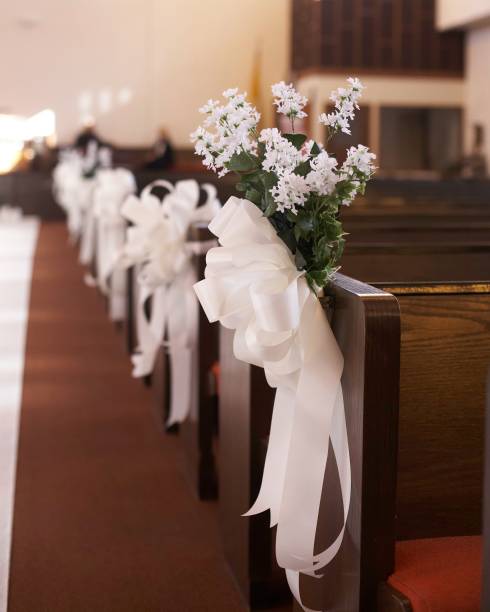 istock Wedding flowers in church. 1003946618