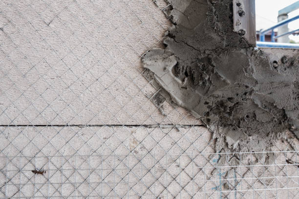 istock house wall construction protect with Welded wire mesh  at wall corner 1003951606