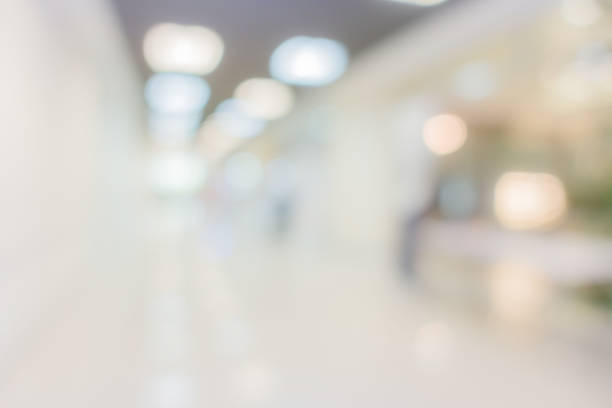 istock blur image background of corridor office hospital walkway 1003956584