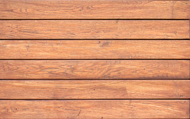 istock closeup background of Yellow wood texture 1003957370