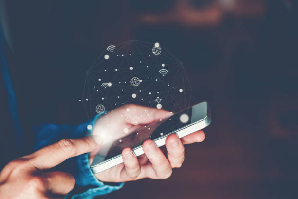 istock Businessman using mobile online icon social networking connection on screen 1003964658