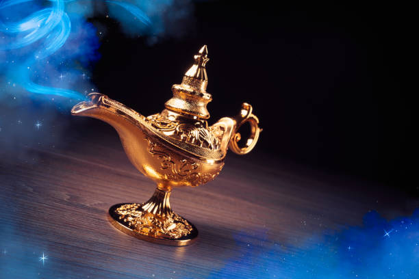 istock Magic Lamp with smoke in a dark background 1003970298