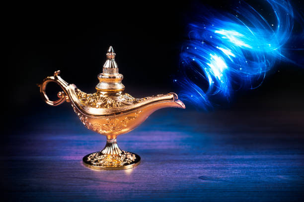 istock Magic Lamp with smoke in a dark background 1003970326
