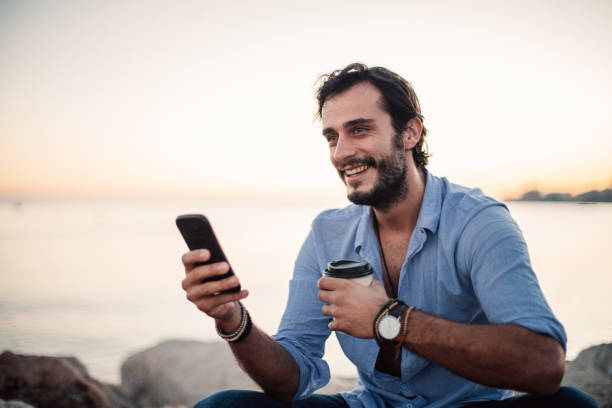 istock Coffee by the sea 1003982714