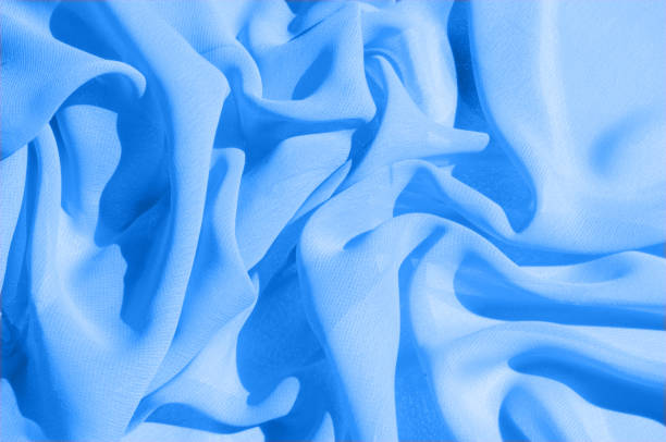istock Background texture, pattern. Azure Blue Silk Twill. Here is a deluxe azure blue silk twill perfect for a vast array of applications. Almost as soft as a cloud, this remarkable silk has a supreme drape 1003983440