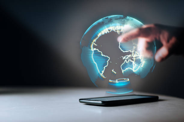 istock Holographic Earth on smartphone 1003989348