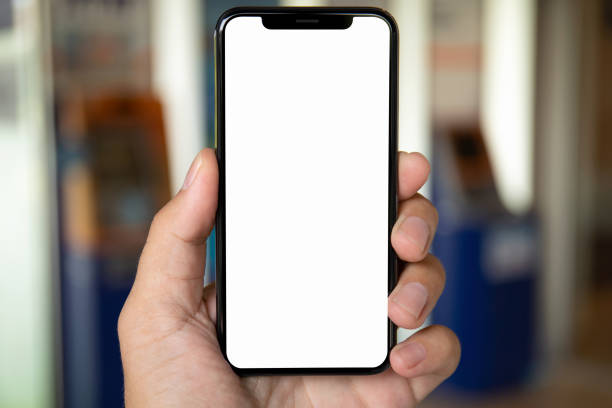 istock man hand holding phone with isolated screen 1003989566