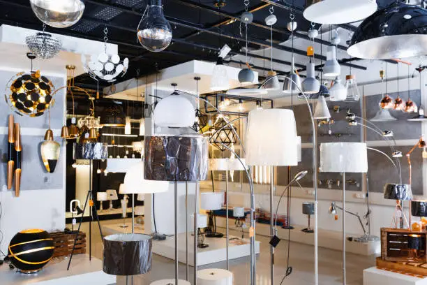 Picture of different fashionable  beautiful stylish lamp with lights in the  designer furniture store