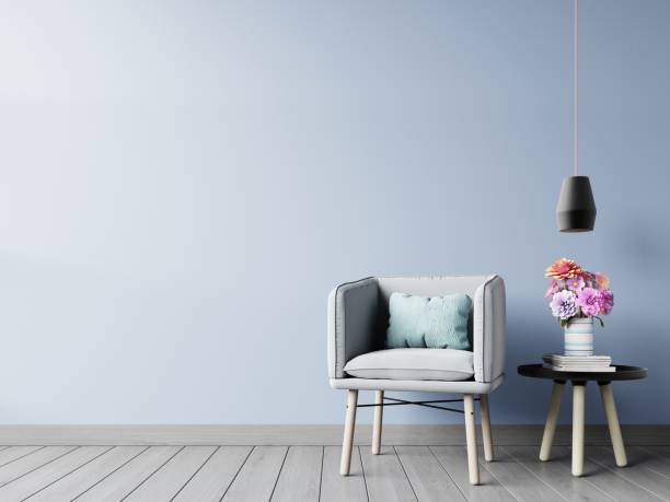 istock Interior with armchair lamp and green plants on dark wall background 1003991132