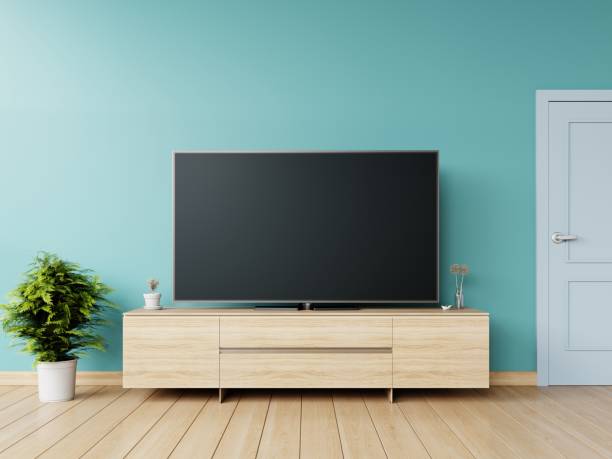 istock TV in live room and wall blue 1003991144