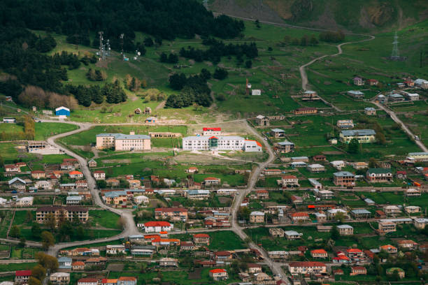 istock Stepantsminda Village In Kazbegi District, Mtskheta-Mtianeti Region, Georgia. Spring Or Summer Season 1003994076