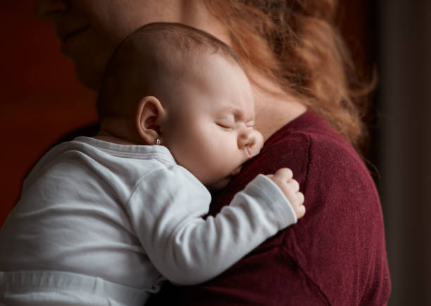istock baby girl sleeping 1004001392