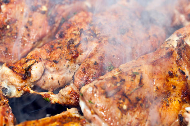 istock Cooking meat on the grill 1004007062
