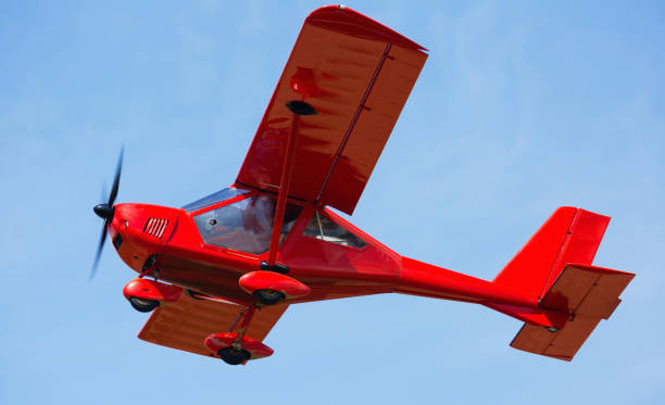 istock Sport airplane soaring in sky 1004021674