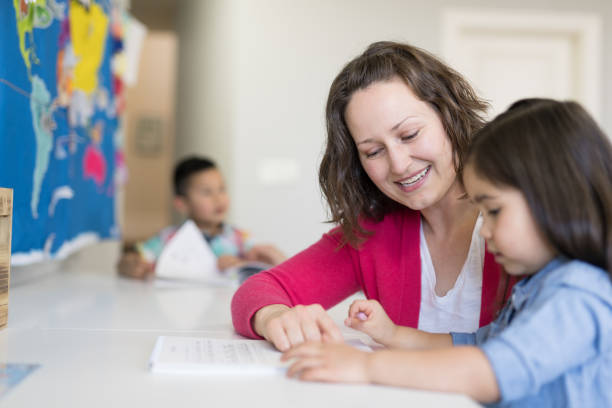 istock Mom homeschooling her young children 1004021932