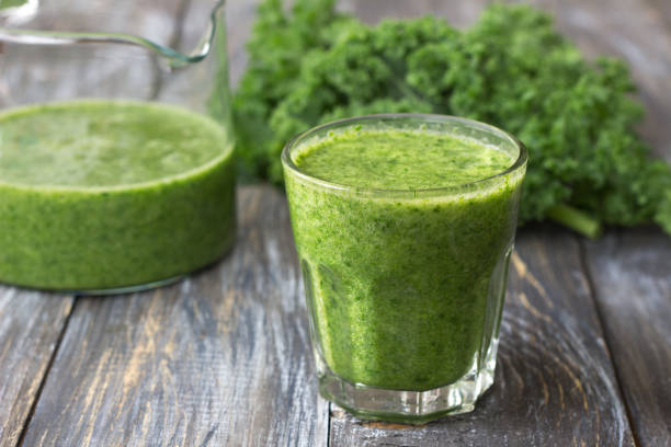 istock Green smoothies with kale, banana and lemon 1004023300