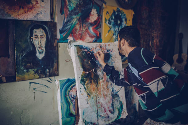 istock Artist painting in studio 1004026576