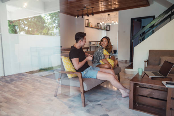 istock A young couple enjoys a morning coffee 1004040158