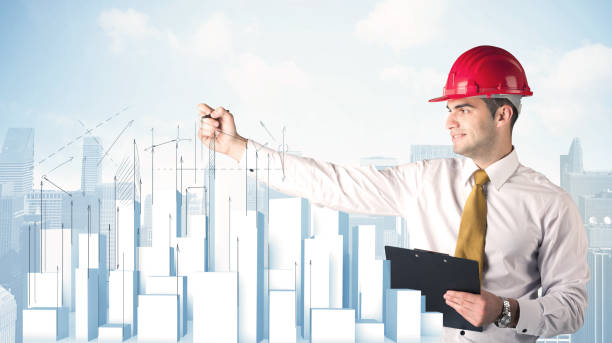 istock Businessman drawing skyscrapers 1004040968