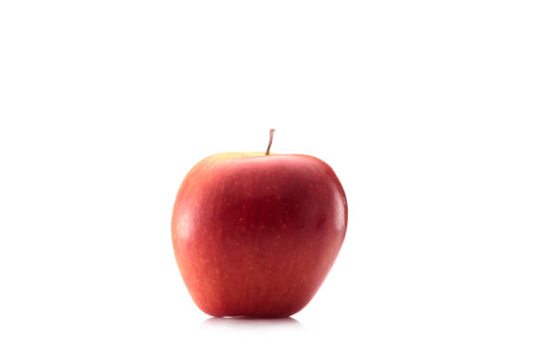 istock close up view of fresh apple isolated on white 1004045286