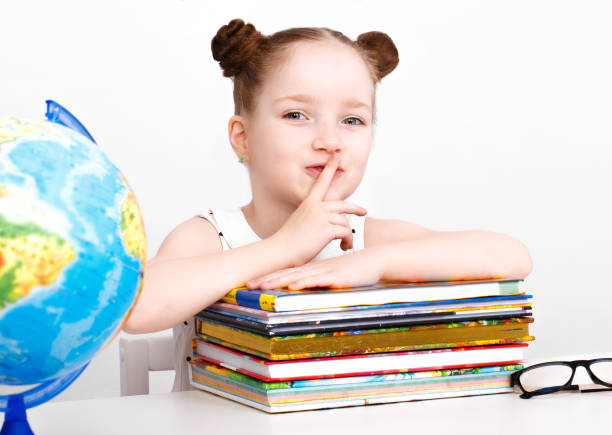 istock Funny little girl first-grader. 1004049094