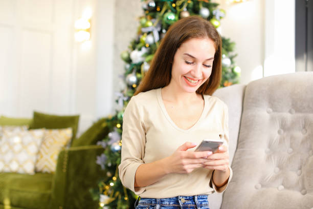 istock architect female using smartphone to watch photos in social netw 1004061180