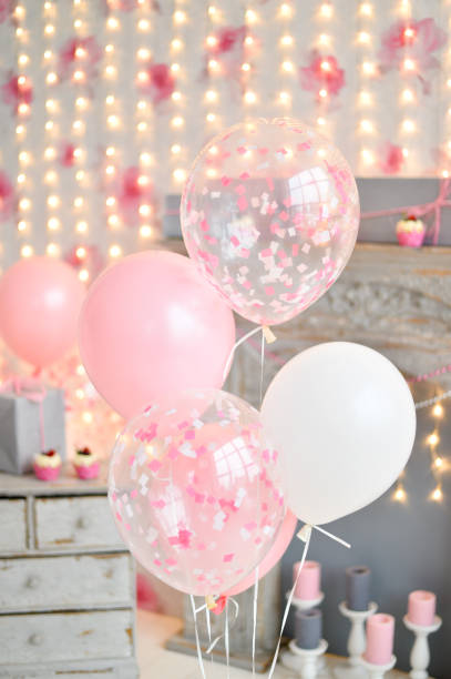 istock Birthday decorations. Balloons pink and white. 1004065432