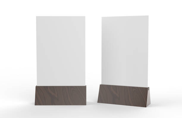 istock Blank table tent mock up template on isolated white background, Stand for acrylic tent card Used for Menu Bar and restaurant, 3d illustration 1004070376