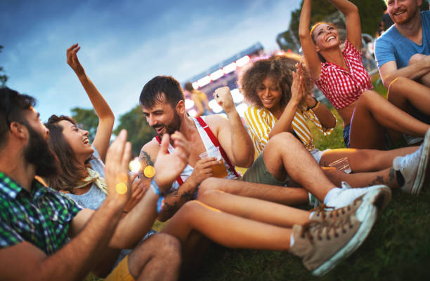 istock Friends dancing at a concert. 1004086018