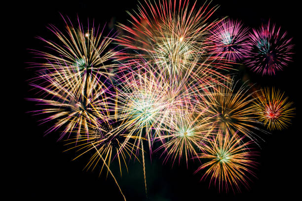 istock Fireworks Celebration at night on New Year and copy space - abstract holiday background. 1004090428