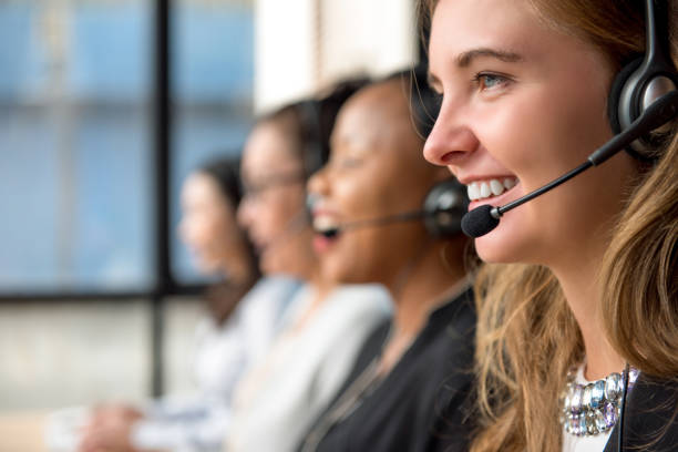 istock Woman customer service agents working in call center 1004108422