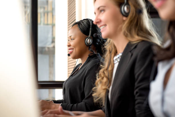 istock International diverse woman customer service team working in call center 1004108464